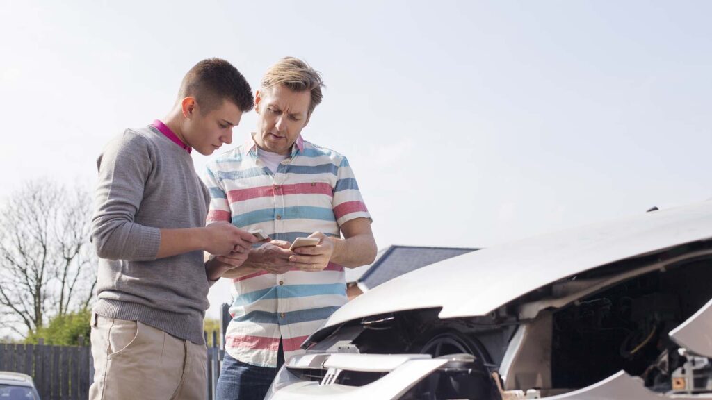 drivers exchanging information after a crash