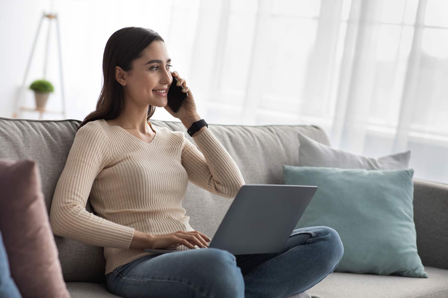 motorist at home talking to an insurance company