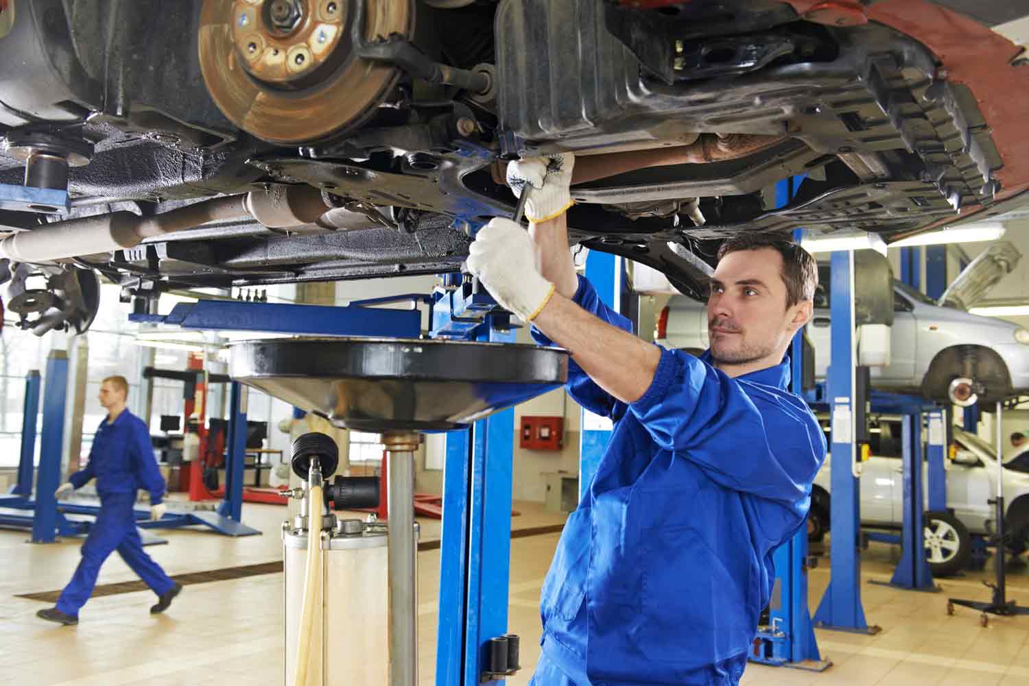 mechanic working on a car